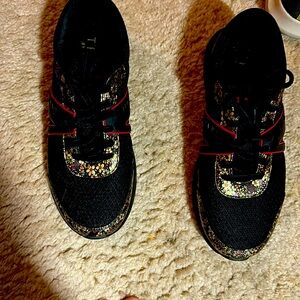 Black tennis shoes I own to many Comfortable and unique